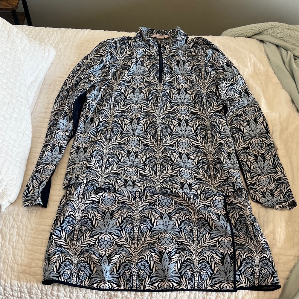 Tommy Bahama Botanical everyday active zip top and skort set. Navy andlight blue